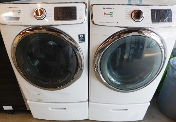 SAMSUNG WASHER AND GAS DRYER-WITH STEAM- ON PEDESTALS - PRODUCT ID# A-687