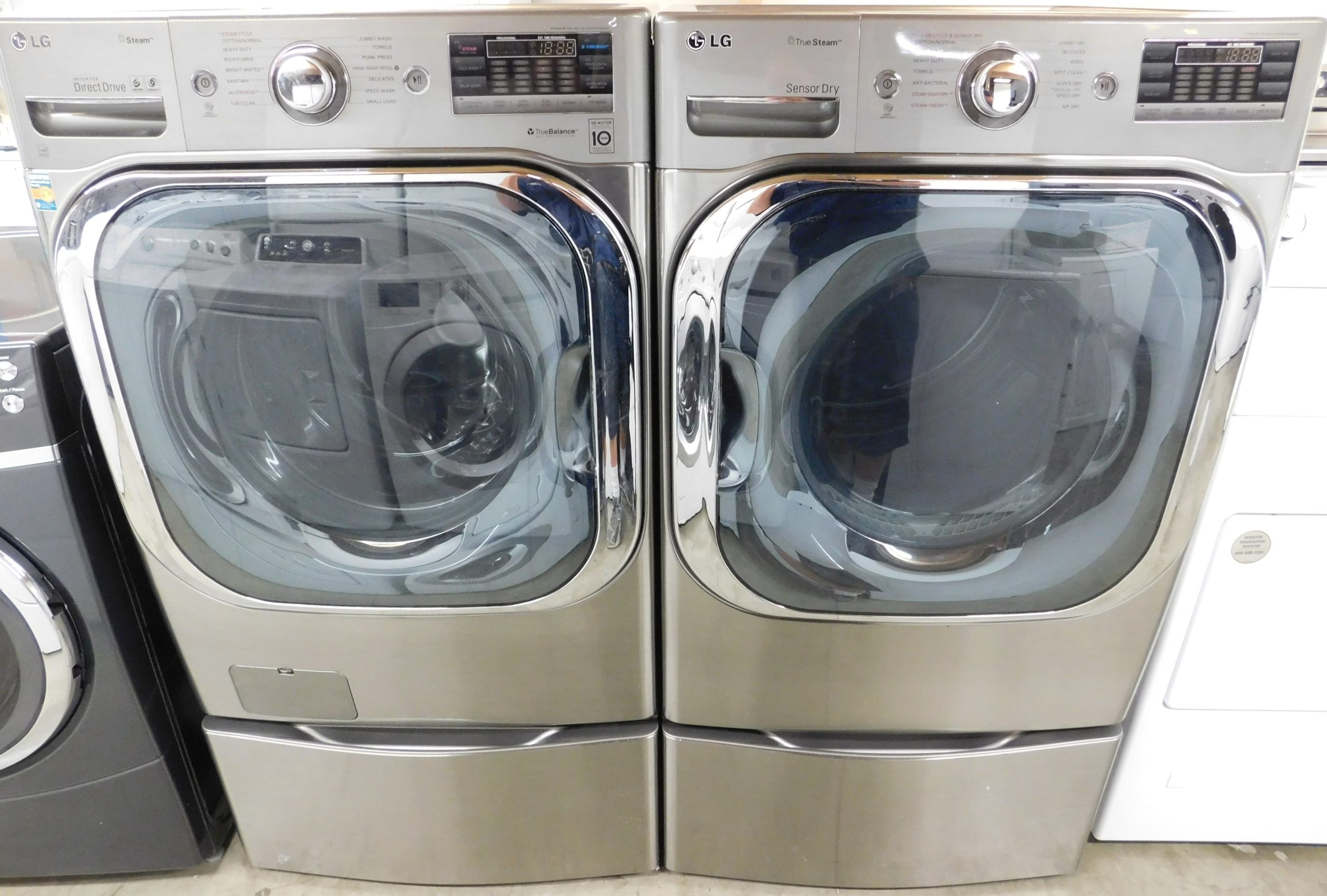 LG WASHER AND GAS DRYER-WITH STEAM- ON PEDESTALS - PRODUCT ID# A-378