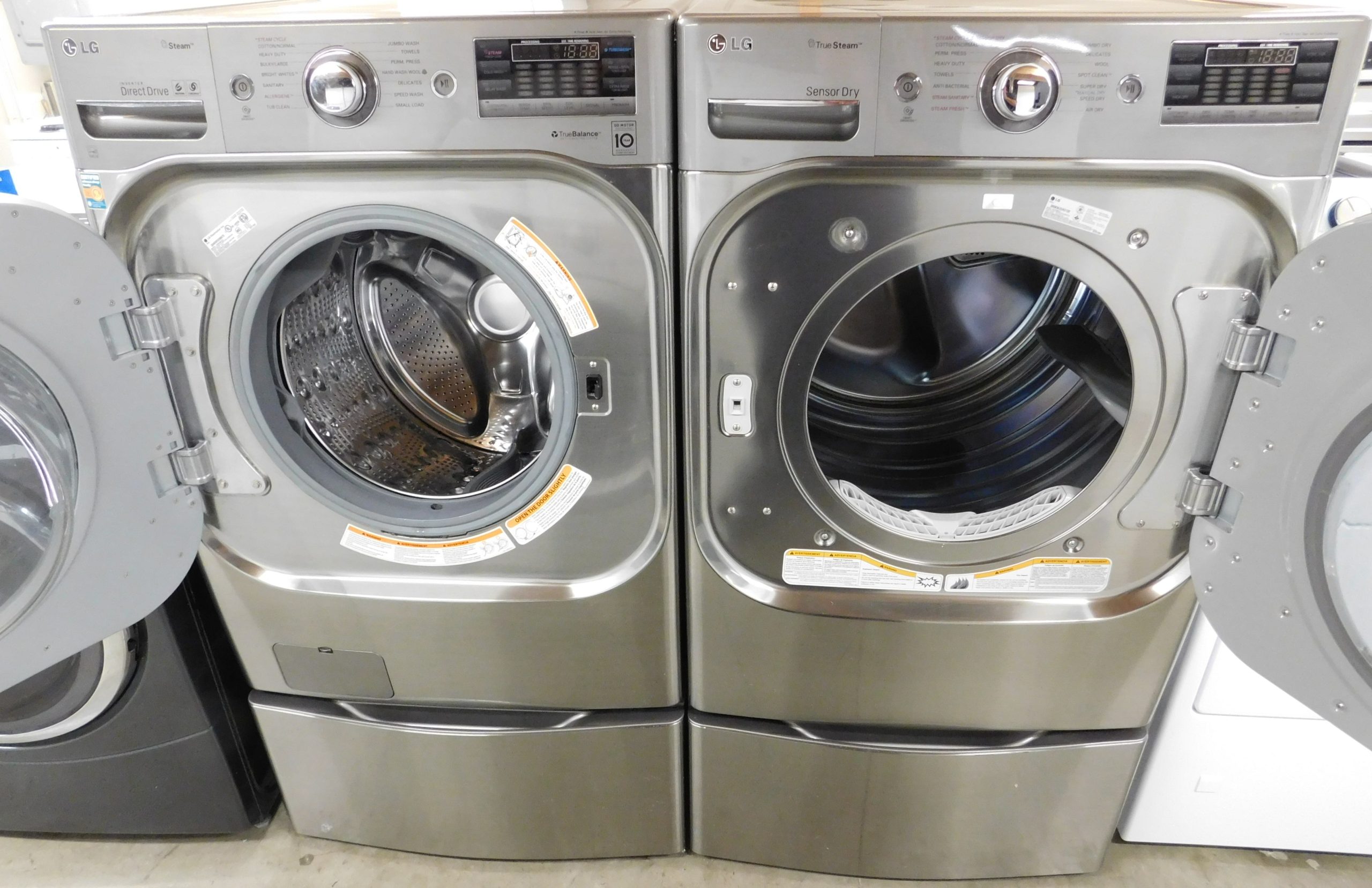 LG WASHER AND GAS DRYER-WITH STEAM- ON PEDESTALS - PRODUCT ID# A-378 - Image 2