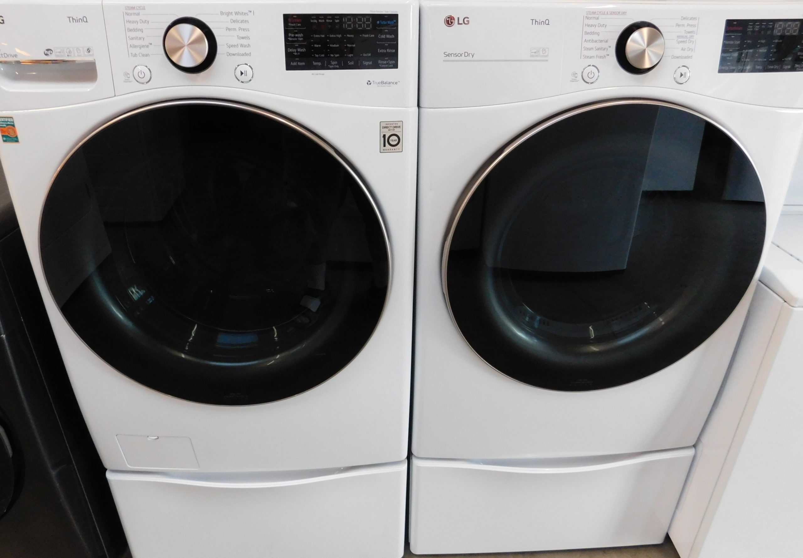 LG WASHER AND ELECTRIC DRYER-(VERY NEW)- ON PEDESTALS - PRODUCT ID# A-140